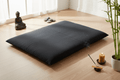 Organic Buckwheat Zabuton Meditation Mat in serene meditation space