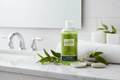 Razzmatazz Tea Tree Shampoo in fresh spa setting